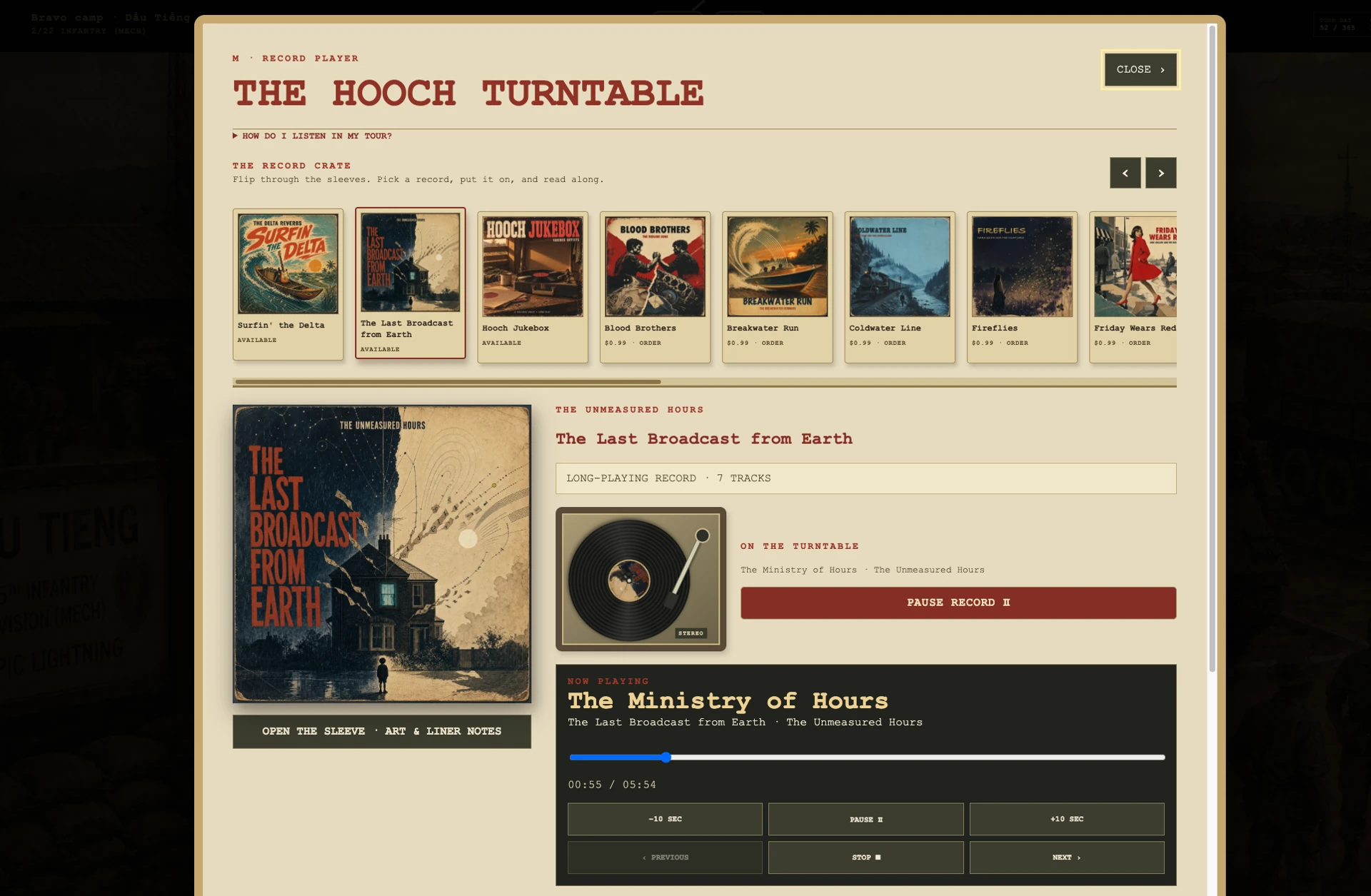 The record player open over the camp scene, with an album sleeve, track list and playback controls.